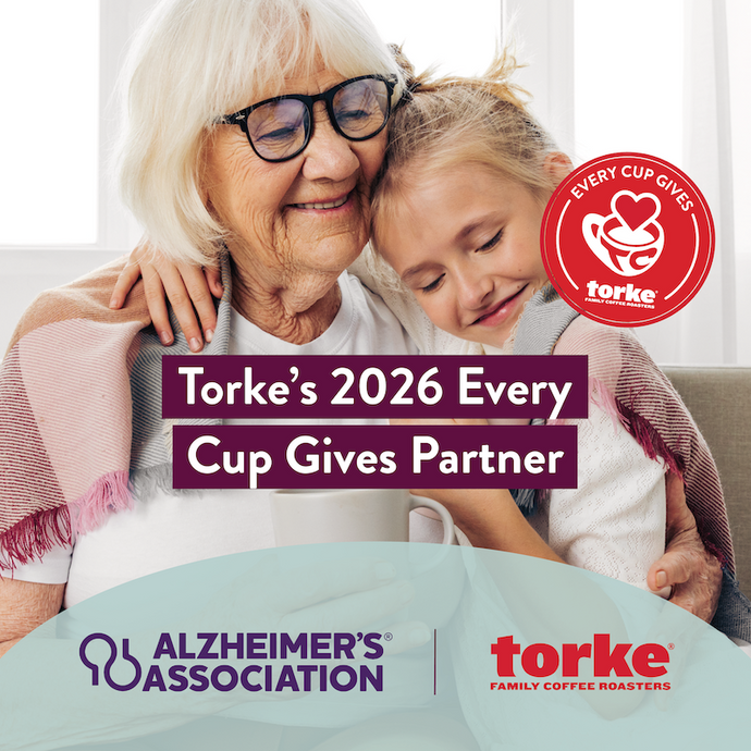 Grandmother and granddaughter hugging with Torke and Alzheimer's Association logos.