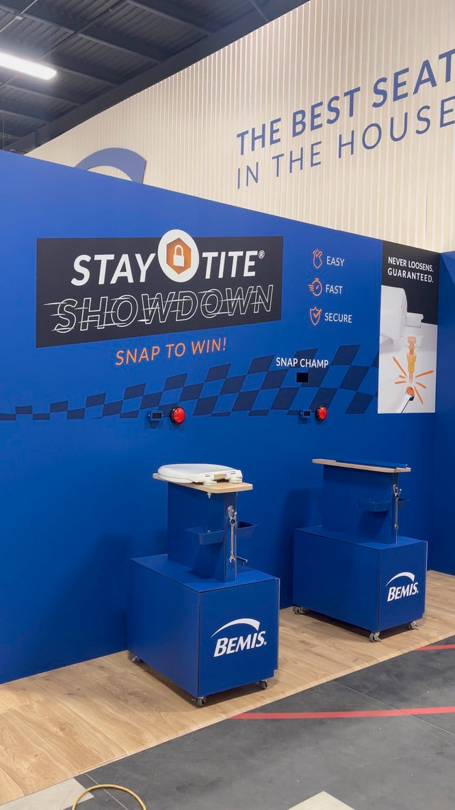 Bemis booth at an event with 'Stay Tite Showdown' branding and promotional materials.