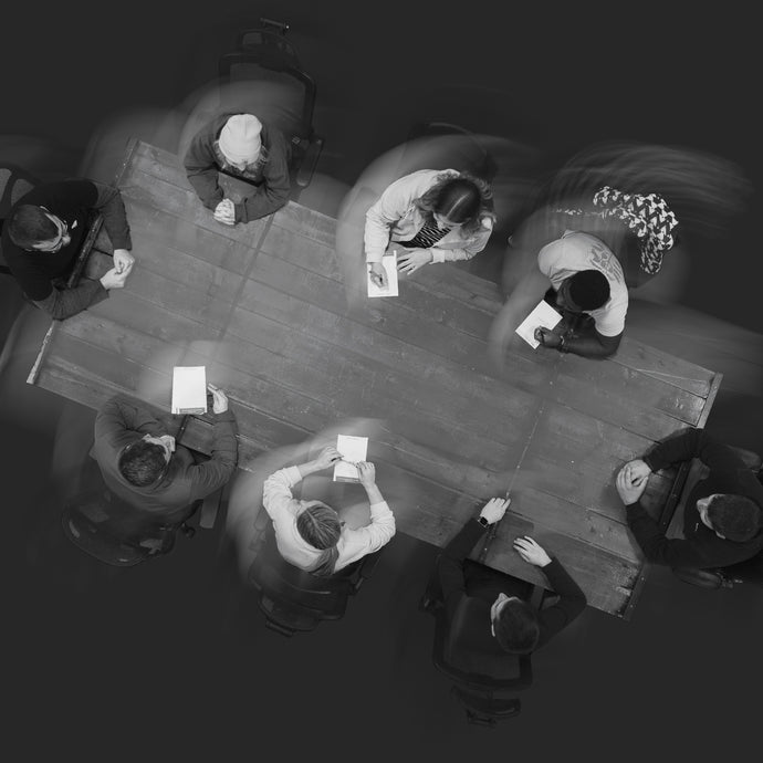 Team sitting around a table