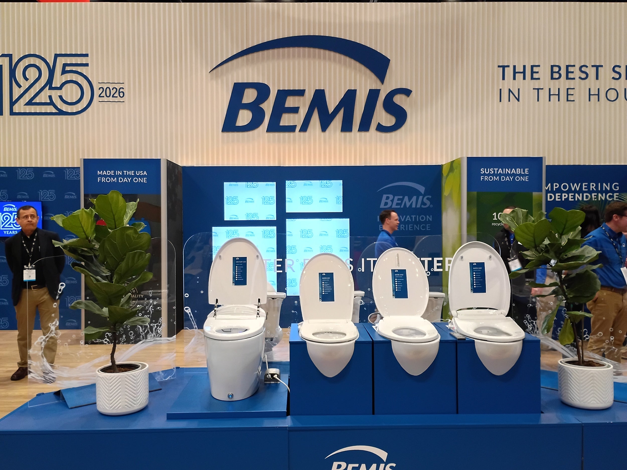 Bemis display with toilets at a trade show booth