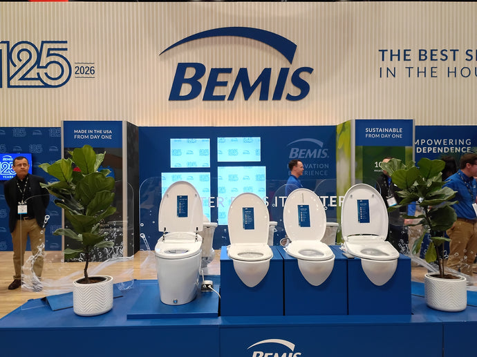 Bemis display with toilets at a trade show booth