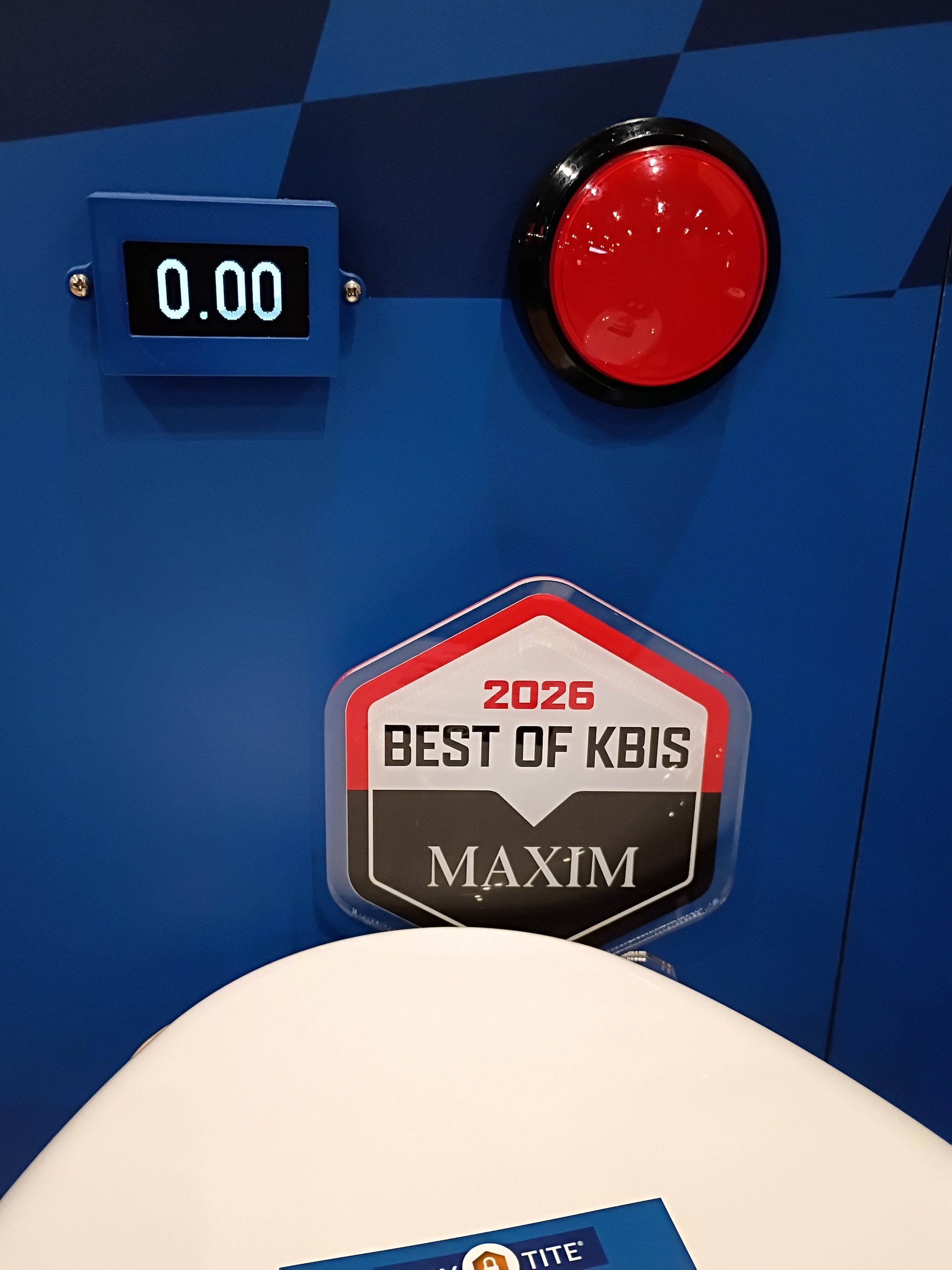 Blue machine with a red button and '2026 Best of KBIS Maxim' badge.