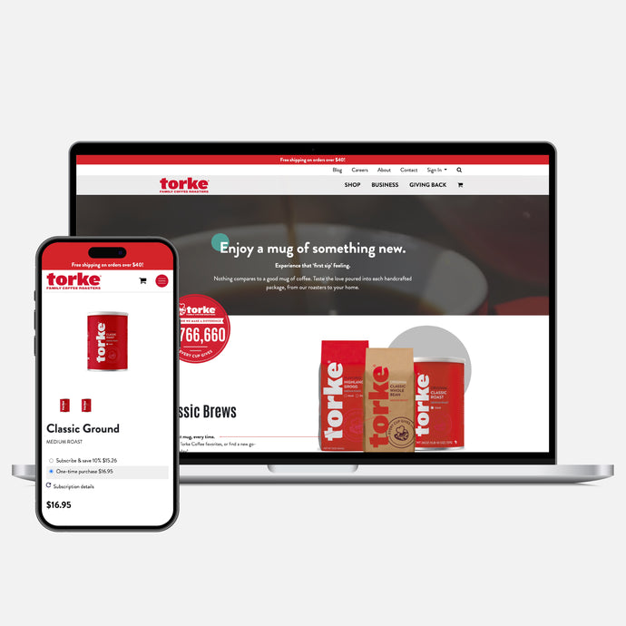 Laptop and smartphone displaying the Torke Coffee website on a white background